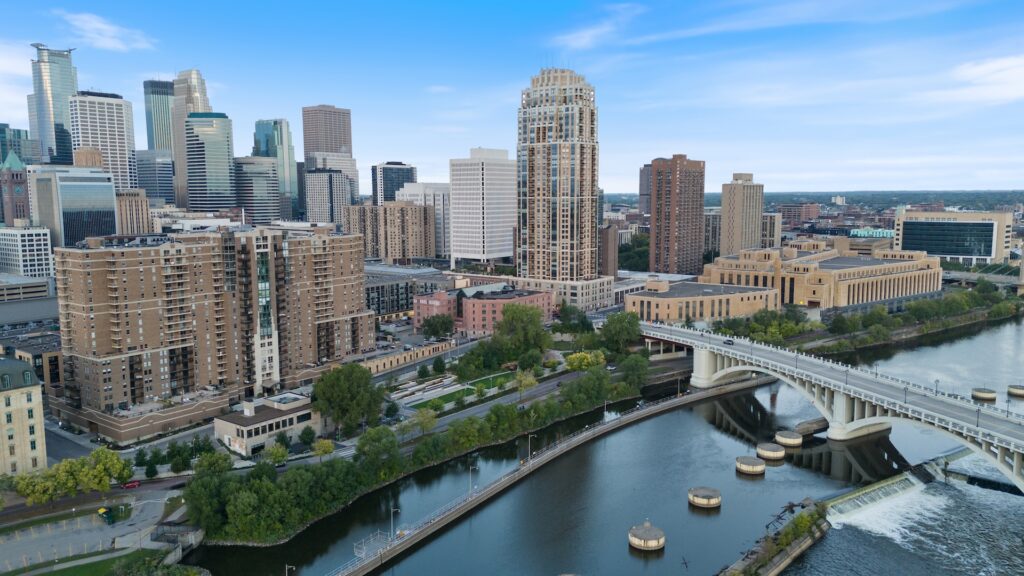 RiverWest with downtown Minneapolis in the background and the river in the foreground