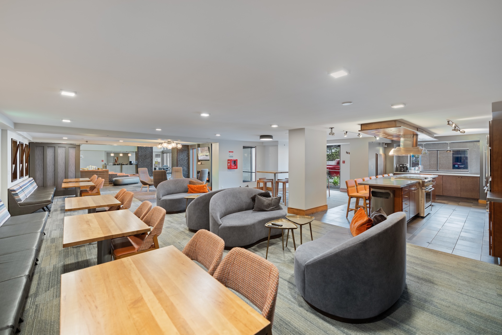 Lobby Social Room, tables and chairs, kitchen